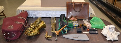 Lot 572 - A Buescher true-tone saxophone with carry case,...