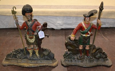 Lot 484 - Two cast iron Scottish Highlander door stops/...
