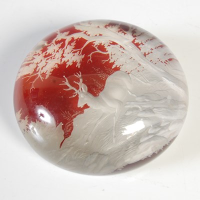 Lot 406 - A Bohemian red stained glass paper weight with...