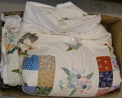 Lot 554 - A handmade vintage style patchwork quilt with...