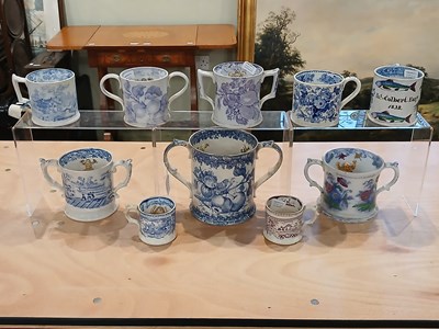 Lot 449 - A group of ten 19th century ceramic frog and...