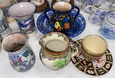 Lot 448 - A Poole Pottery vase of flared form decorated...