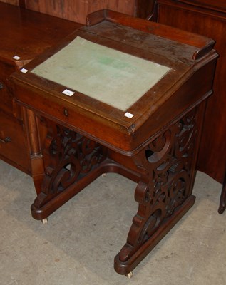 Lot 743 - A Victorian davenport with green baize line...