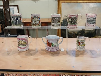 Lot 458 - A 19th century frog loving cup with twin...