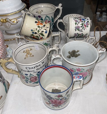 Lot 435 - A 19th century frog loving cup in the form of...