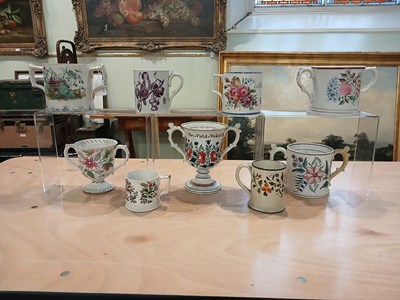 Lot 435 - A 19th century frog loving cup in the form of...