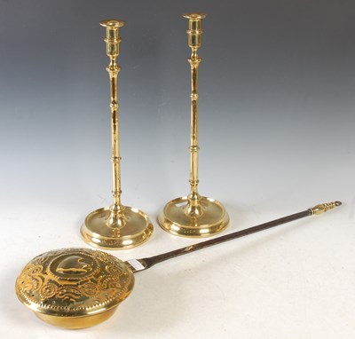 Lot 379 - A pair of 19th century brass candlesticks...