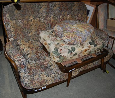Lot 667 - An Ercol two-seat sofa together with an Ercol...
