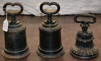 Lot 492 - A pair of cast iron door stops/ porters with...