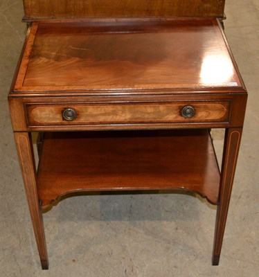 Lot 819 - A 20th century mahogany two-tier side table...