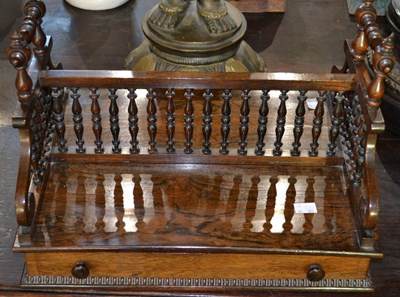 Lot 498 - A Regency rosewood twin compartment book...