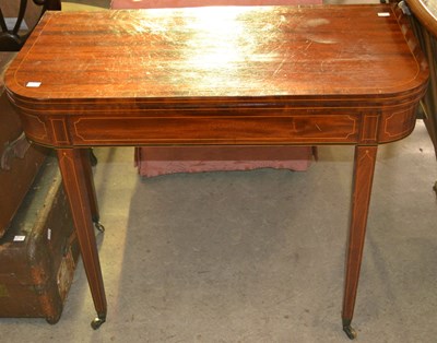 Lot 801 - A Regency line inlaid mahogany fold over tea...