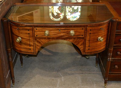 Lot 820 - A Regency mahogany serving table with central...