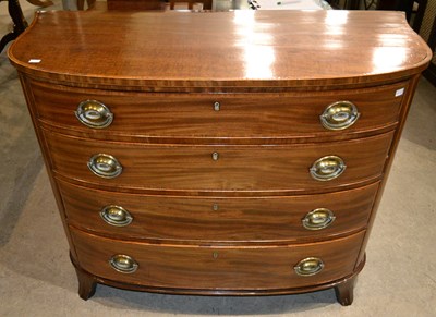 Lot 818 - A Regency line inlaid mahogany bow front four...