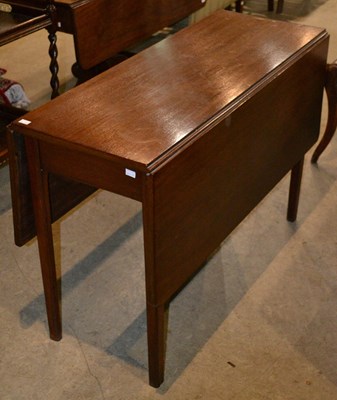 Lot 846 - A 19th century mahogany drop leaf dining table...