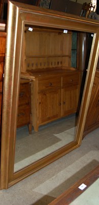 Lot 748 - A rectangular gilt framed wall mirror, 145cm x...