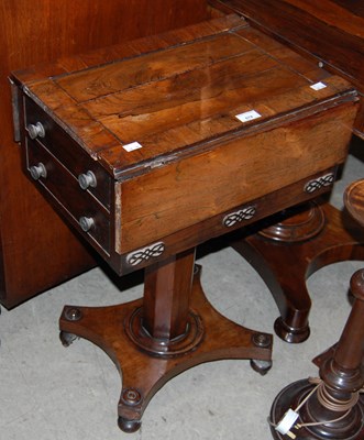 Lot 674 - A 19th century rosewood work table on...