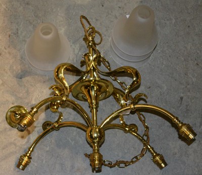 Lot 570 - A 20th century brass ceiling light, after W. A....