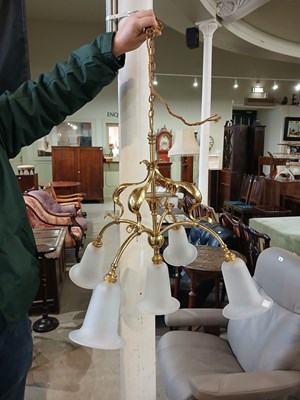 Lot 570 - A 20th century brass ceiling light, after W. A....