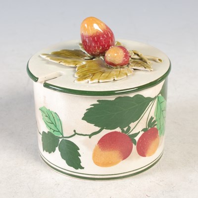 Lot 394 - A Wemyss style pottery preserve jar and cover...