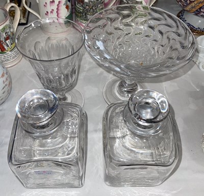Lot 457 - A pair of glass spirit decanters of squared...