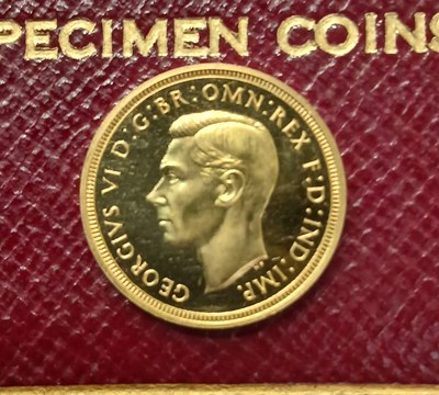 Lot 19 - A 1937 Royal Mint gold proof sovereign four...
