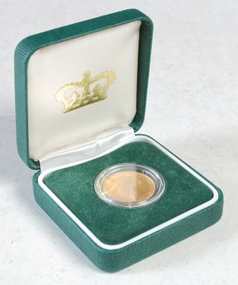 Lot 23 - A Victorian gold sovereign dated 1871 in green...