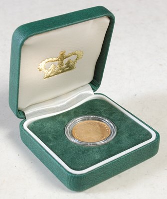 Lot 31 - A Victorian gold sovereign dated 1871 in green...
