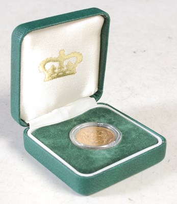 Lot 32 - A Victorian gold sovereign dated 1887 in green...