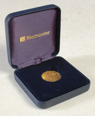 Lot 27 - A George IV gold sovereign dated 1827 in blue...