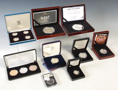Lot 64 - A collection of silver proof coins to include;...