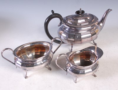 Lot 69 - A Sheffield silver three piece tea set, gross...