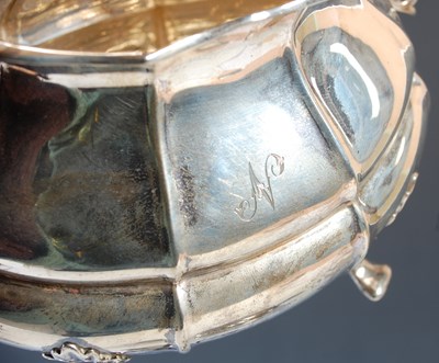 Lot 72 - A Sheffield silver four piece tea set...