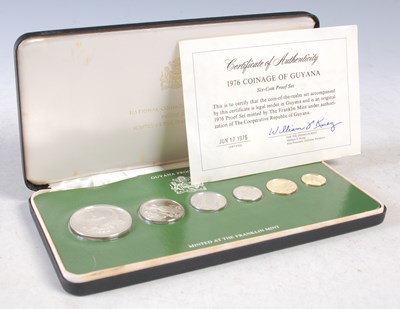 Lot 82 - Franklin Mint, a 1976 coinage of Guyana six...