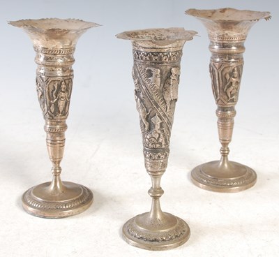 Lot 97 - A pair of Indian white metal bud vases,...