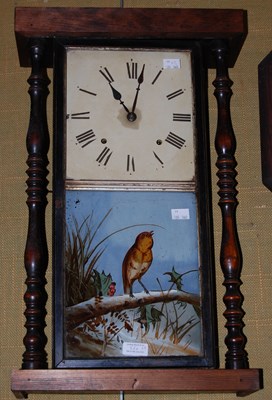 Lot 526 - A rectangular wall clock with turned wooden...