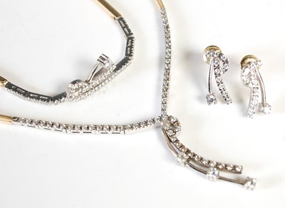 Lot 120 - A suite of yellow and white gold and diamond...