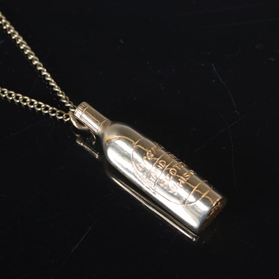 Lot 132 - A 9ct gold Grant's Scotch Whisky bottle...