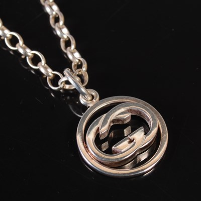 Lot 150 - Gucci, a silver pendant necklace, the pendant...
