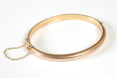 Lot 159 - A 9ct gold hinged bangle, 6.3g.
