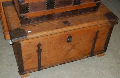 Lot 709 - A metal bound wooden storage trunk