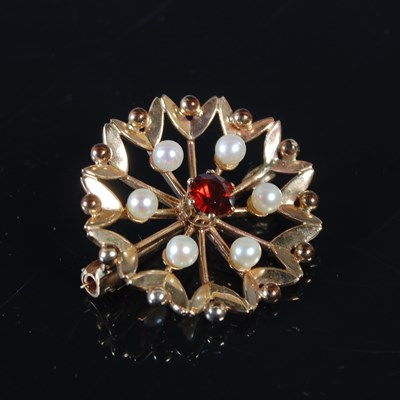 Lot 179 - A 9ct gold garnet and pearl set circular...