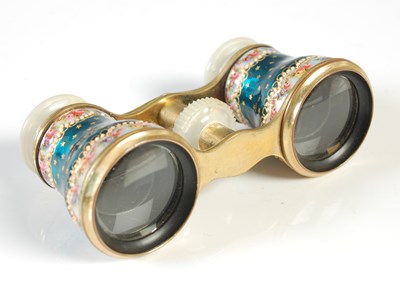 Lot 215 - A pair of French gilt metal and enamel opera...