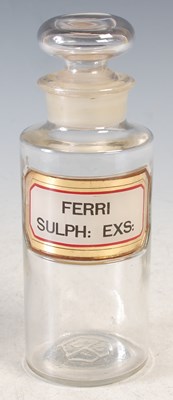 Lot 227 - A vintage clear glass apothecary bottle and...