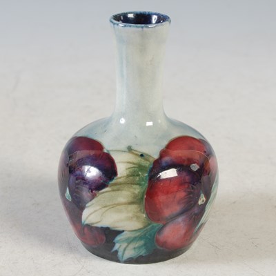 Lot 233 - A Moorcroft miniature pottery vase decorated...