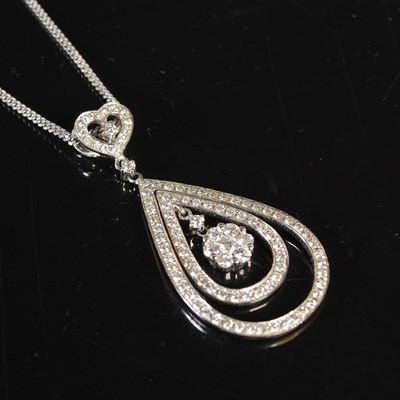 Lot 240 - Iliana, an 18ct white gold and diamond pendant...