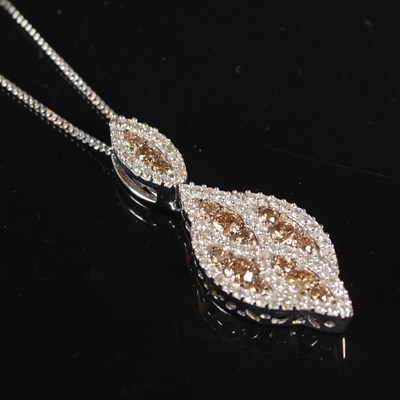 Lot 247 - An 18ct white gold diamond and gemstone set...