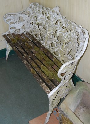 Lot 717 - A white painted cast metal fern pattern garden...