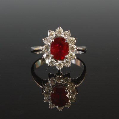 Lot 263 - An 18ct white gold garnet and diamond cluster...