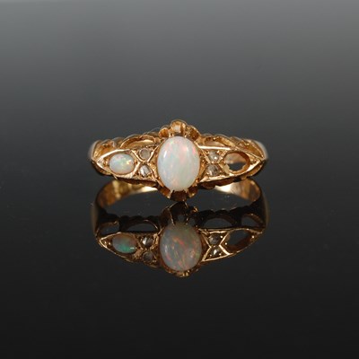 Lot 268 - An 18ct gold opal and diamond chip dress ring,...